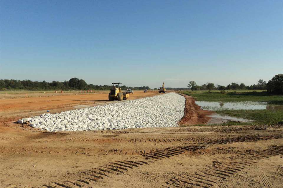 Airport realigns taxiway after stabilizing and reclaiming large pond