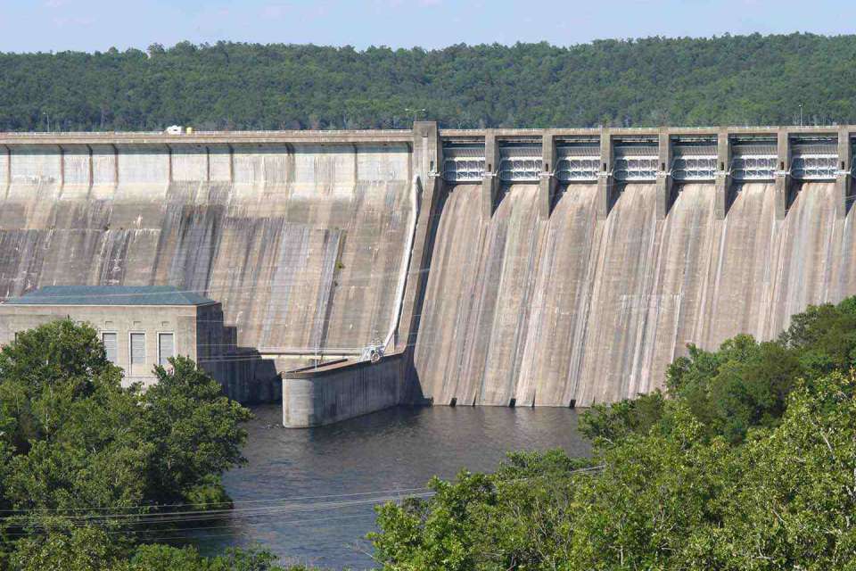 Siphon provides minimum flow through dam, benefits fish habitat